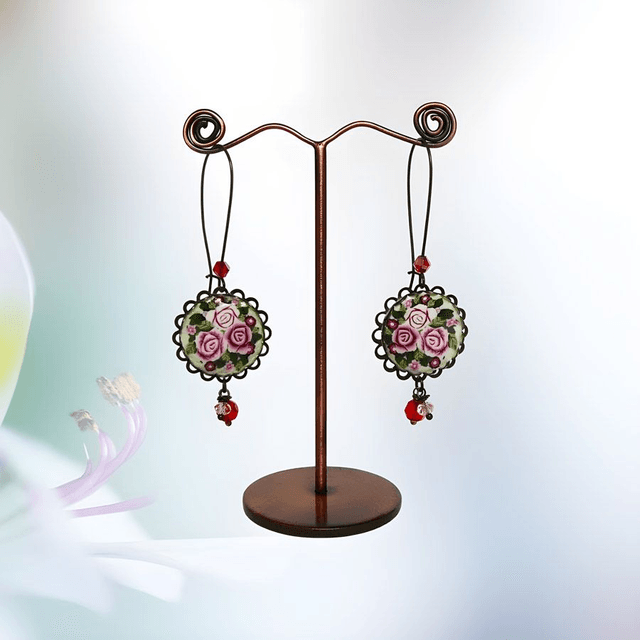 Boucles d'oreilles pendantes trois roses